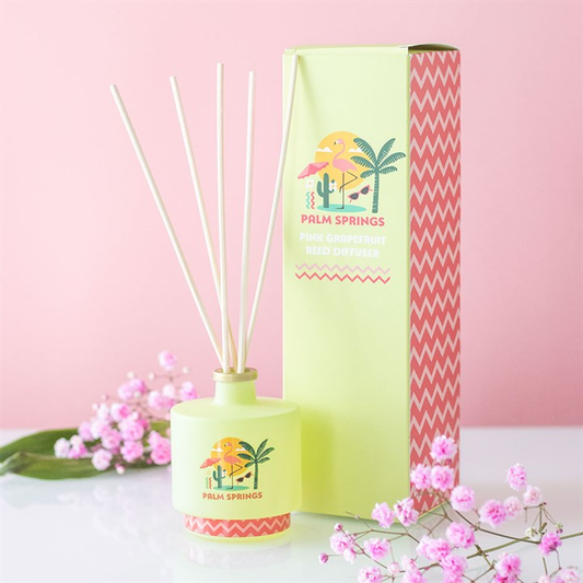 Palm Springs diffuser with packaging on a pink background
