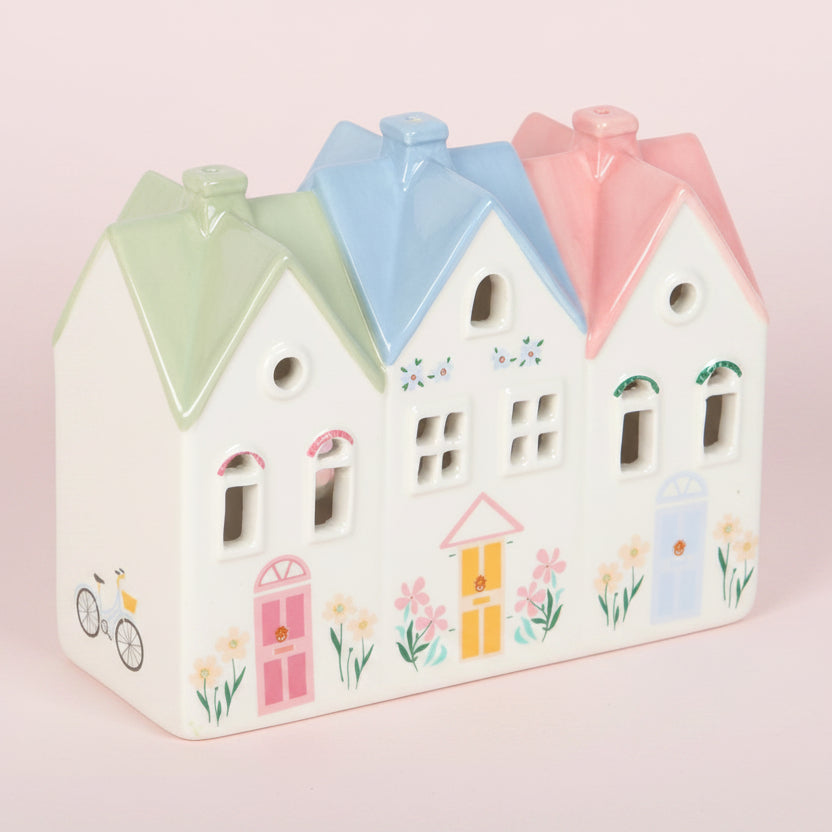 white houses with colourful pastel roof tealight incense burner