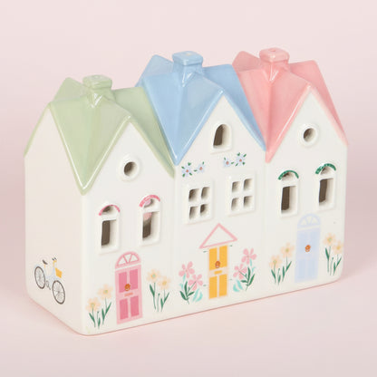 white houses with colourful pastel roof tealight incense burner