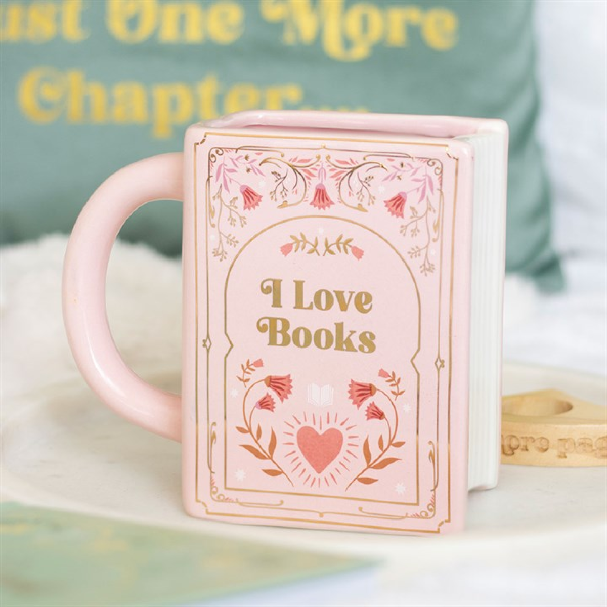 ceramic pink book mug with words i love books in metallic gold colour